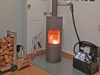 Feldversuch Kaminofen nach DIN EN 13240 und integrierter T2O2-Regeltechnologie