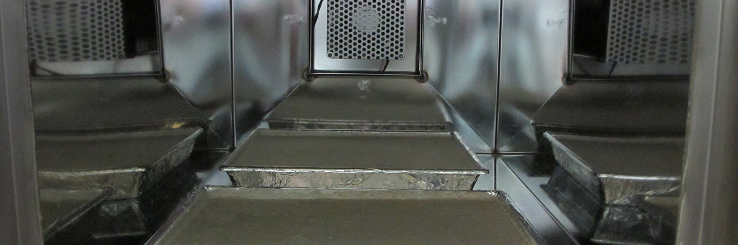 Screed specimens in the emission test chamber for determining VOC emissions Screed specimens in the emission test chamber for determining VOC emissions