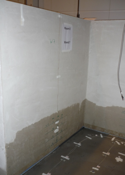 Water infiltrating a wall after simulation of water damage