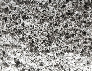 Open-celled mineral foam